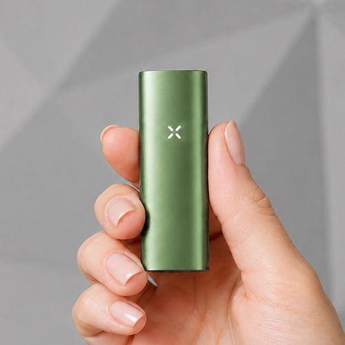 Hand holding a Pax Flow vaporizer.