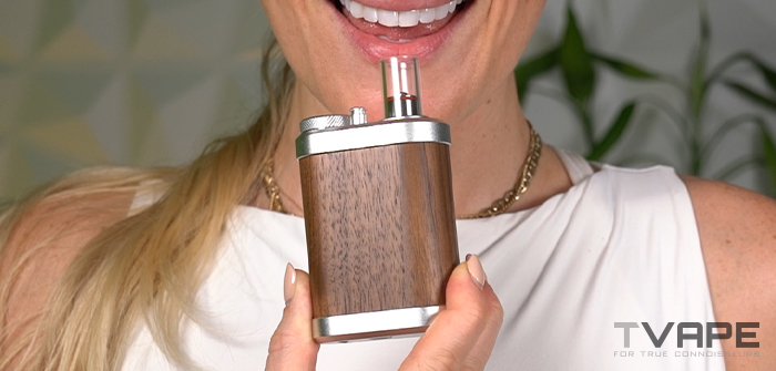 Tinymight 2 dry herb vaporizer about to be used by woman