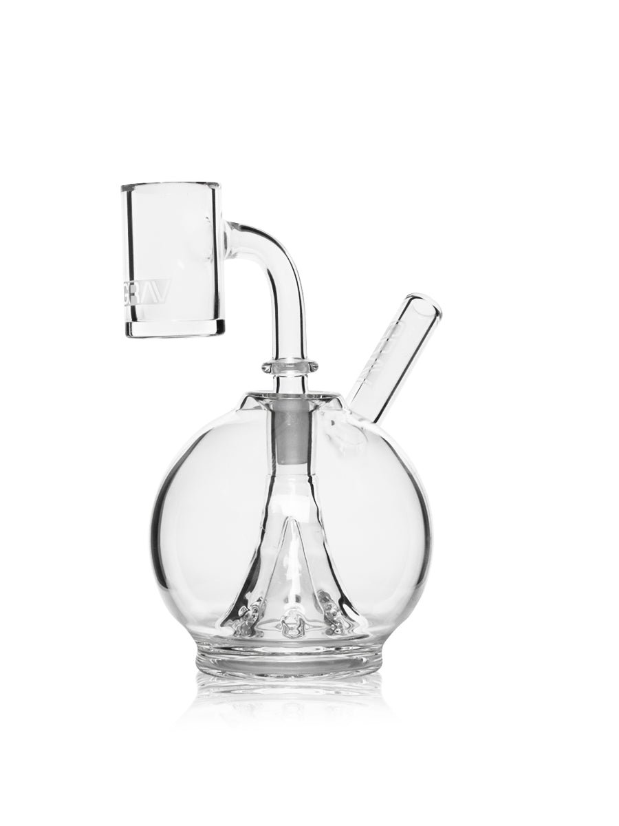 GRAV Eclipse Rig in clear glass with round chamber, angled mouthpiece, quartz banger, and conical percolator.