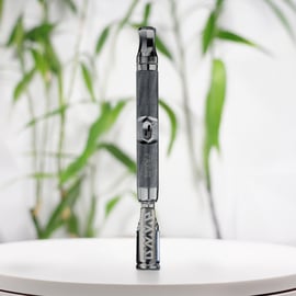 Steel-colored DynaVap M7 XL portable vaporizer, crafted in the USA with titanium and stainless steel, offering ergonomic design and efficient heat activation for smooth vaping.