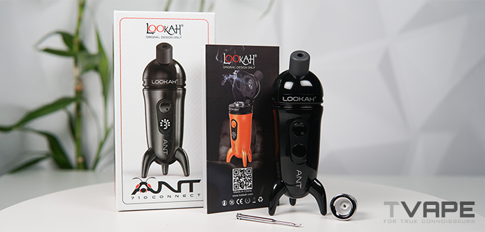Lookah Ant Dab Pen next to its box and parts