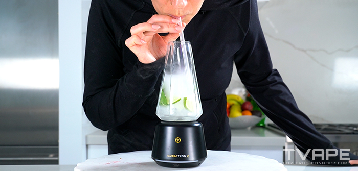 Tronian Omegatron 2 vapor cup is being used by a woman in a lifestyle setting