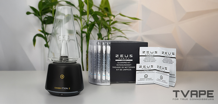 Tronian Omegatron 2 next to the Zeus Purify Grime Kit, including alcohol-filled grime sticks and grime wipes for cleaning the chamber, covers, threads and base.