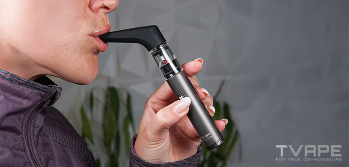 Utillian 6 Dab Pen in a mouth about to be used