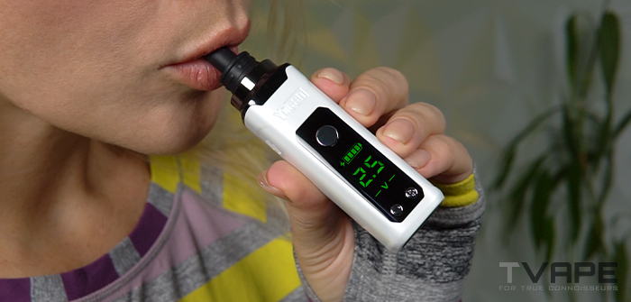 Yocan Nestor Dab pen in a mouth about to be used